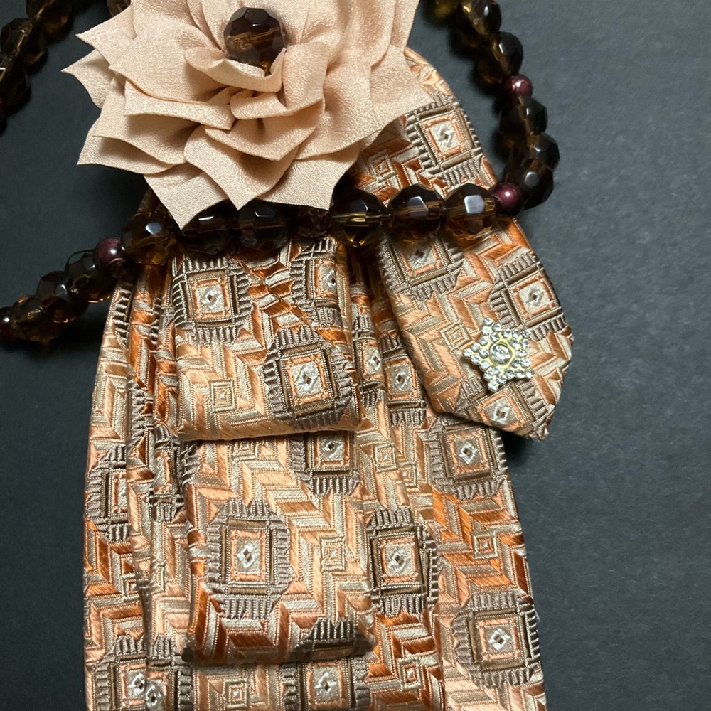 “SOLD” Handcrafted Necktie Necklace with Tan Floral Accent and Brown Beaded - Picture 3 of 5